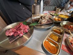 -草家酱蟹炭火烤肉店(珲春南路一店)