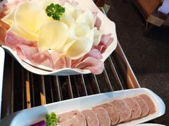 -老牌坊云南鱼豆花火锅(哈西万达店)