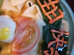 -老牌坊云南鱼豆花火锅(哈西万达店)
