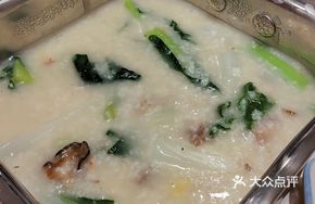 Oyster and Pork Rib Congee with Chinese Broccoli
