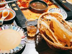 -老牌坊云南鱼豆花火锅(哈西万达店)
