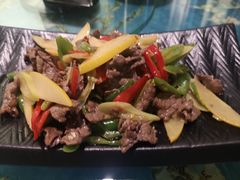 酸木瓜炒牛肉-紫滇源云南生态菜(丹凤街店)