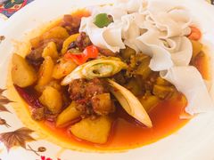沙湾大盘鸡-西域盛宴烧烤新疆菜清真餐厅(古美店)