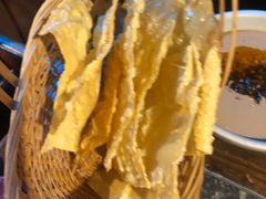 -老牌坊云南鱼豆花火锅(哈西万达店)