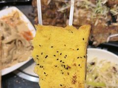 -明何记涮牛肚(品牌首店隋唐植物园南门古城路店)