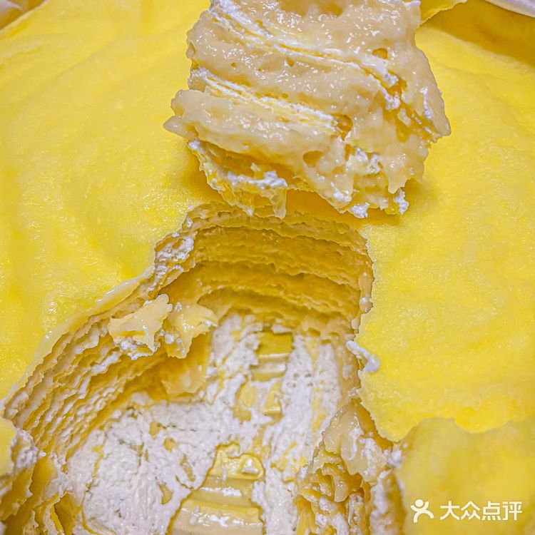 今天的快乐是榴莲千层给的呀[色][色]