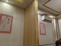 -明何记涮牛肚(品牌首店隋唐植物园南门古城路店)