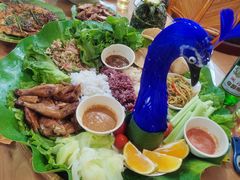 -沐毫傣泐云南菜孔雀宴•手抓饭傣味烧烤(曼听公园店)