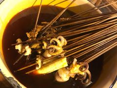 -拈签一笑黄牛肉辣卤串串