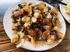 辣炒蛤蜊-1910老鲁味海鲜·戳子肉·青岛菜(金沙滩店)