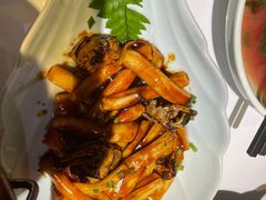 梭子蟹炒年糕-卯时·龙光雅宴·精致锡帮菜(惠山古镇店)