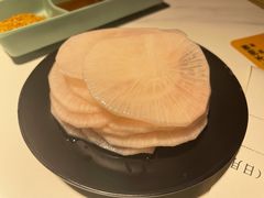 腌萝卜片-猪啊牛呀羊啊铜盘烤肉(正大广场店)