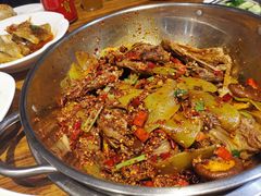 爆辣干锅鸭头-安诚居干锅鸭头(八角店)