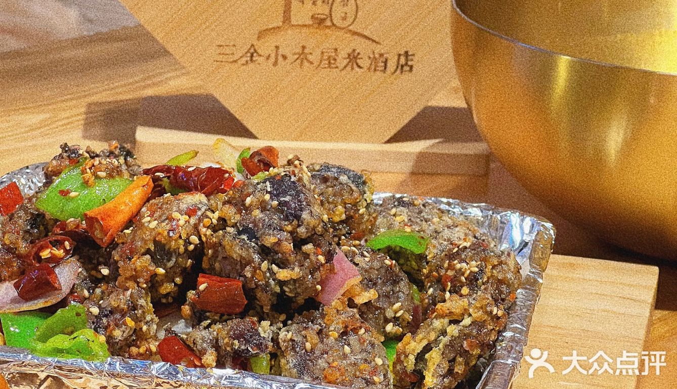 很有调调的小木屋米酒店