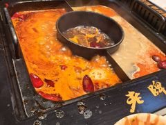 -老牌坊云南鱼豆花火锅(哈西万达店)
