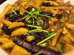 酥肉炖茄子-闯关东东北农家菜(崂山石老人店)
