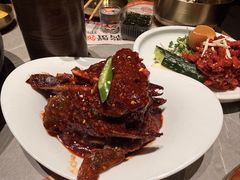 草家招牌酱辣蟹-草家酱蟹炭火烤肉店(珲春南路一店)