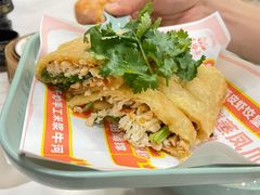 香菜袭击橘糖薄撑-喜势点·糖沙翁手工茶点·本地人茶居(永庆坊店)