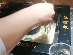 -老牌坊云南鱼豆花火锅(哈西万达店)