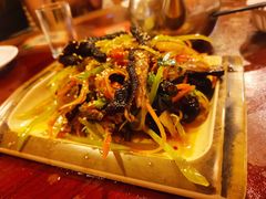 包烧鸡脚筋-多哥水傣味餐厅(司马巷店)