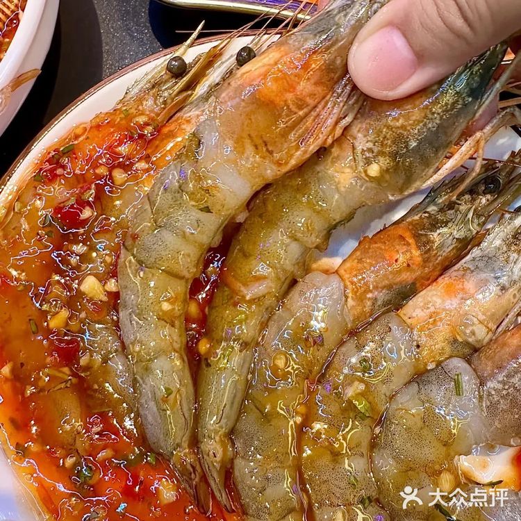 来星海就办了一件事，吃生腌…