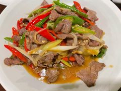 酸木瓜炒牛肉-紫滇源云南生态菜(丹凤街店)