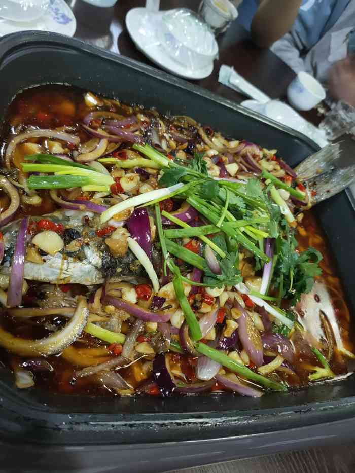 清真·袍哥纸上烤鱼(盛唐城店)-"味道很棒烤鱼很嫩,老板娘很热情,送了