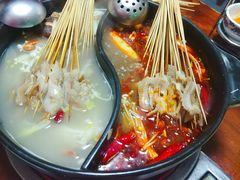 -明何记涮牛肚(品牌首店隋唐植物园南门古城路店)
