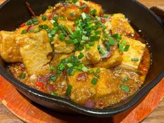 香煎石屏豆腐-云海肴·汽锅鸡·云南代表菜(天山百盛优客店)