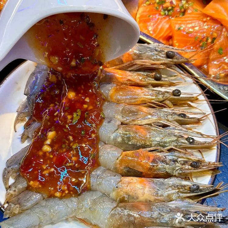 来星海就办了一件事，吃生腌…