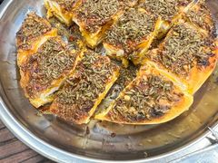 隔壁店的蒜蓉烤馕-清真·马峰烤肉(小学习北巷店)