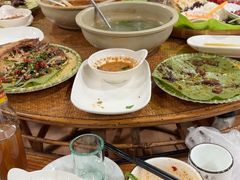 -沐毫傣泐云南菜孔雀宴•手抓饭傣味烧烤(曼听公园店)
