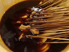 -拈签一笑黄牛肉辣卤串串