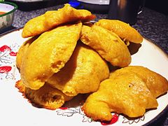 大饼子-山里屯铁锅炖(哈尔滨中央大街店)