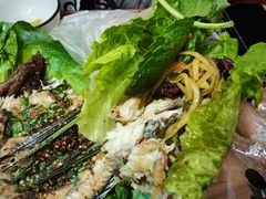 -沐毫傣泐云南菜孔雀宴•手抓饭傣味烧烤(曼听公园店)