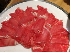 -明何记涮牛肚(品牌首店隋唐植物园南门古城路店)