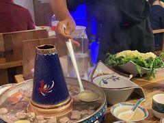 -毛辣果·贵州红酸汤牛肉火锅(西单店)
