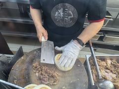 手工现场切馍-樊记腊汁肉(竹笆市总店)