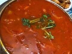 锅仔西红柿炖牛腩-闻道食府烙饼卷带鱼(原车耳营店原大觉寺店)