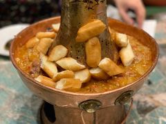土司铜锅油焖鸡-浩海火烧云傣家菜(京广店)