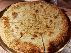 刚出炉的烤馕-谷丽麦馕新疆菜·清真(步步高梅溪新天地店)