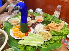 -沐毫傣泐云南菜孔雀宴•手抓饭傣味烧烤(曼听公园店)
