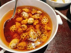 古越陈酿煮花螺-杭州西子湖四季酒店·金沙厅