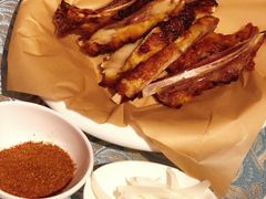 馕坑果木烤羊排-巴扎美食·新疆菜·西域歌舞表演餐厅(新疆大厦店)