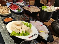 -老牌坊云南鱼豆花火锅(哈西万达店)