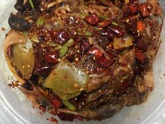 爆辣干锅鸭头-安诚居干锅鸭头(八角店)