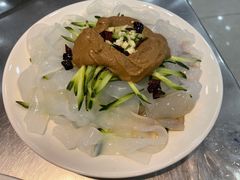 东北大拉皮-屯老二农家铁锅炖·行业领军者(梅江店)