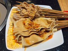 -明何记涮牛肚(品牌首店隋唐植物园南门古城路店)