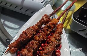 Signature Lamb Skewers on Red Willow Branches