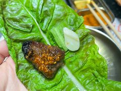 -草家酱蟹炭火烤肉店(珲春南路二店)
